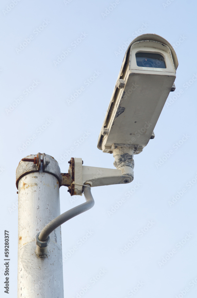 CCTV Security camera on blue sky background CCTV Security camera on blue sky background