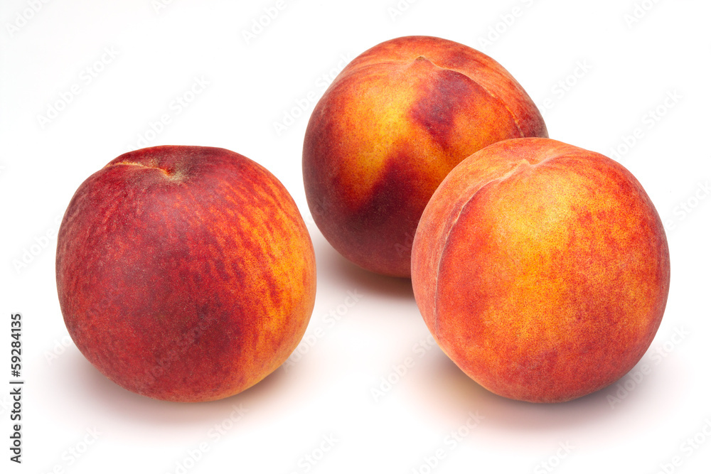 Three peaches isolated on white background Three peaches isolated on white background
