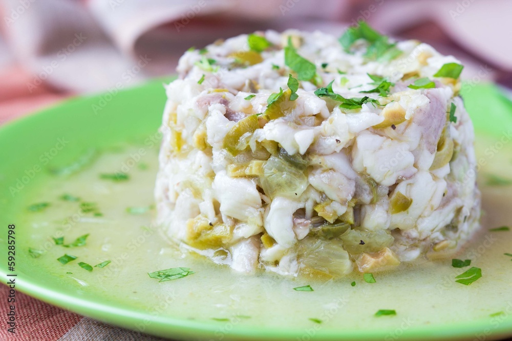 Tartar ceviche of raw white fish with olives, lemon, sauce Tartar ceviche of raw white fish with olives, lemon, sauce