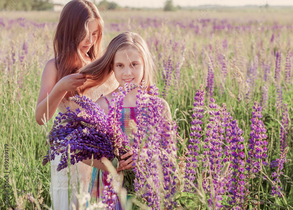 Two adorable girl with flowers outdoor Two adorable girl with flowers outdoor