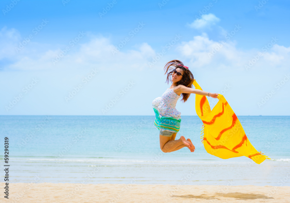 Beautiful Girl Jumping on The Beach. Vacation Concept Beautiful Girl Jumping on The Beach. Vacation Concept