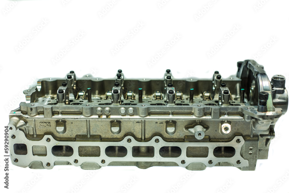 Part of car engine, four valve in head for each cylinder