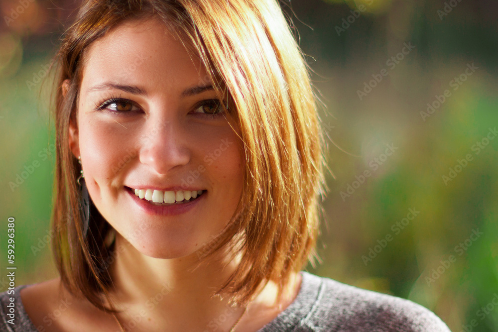 Fototapeta premium Portrait Of Young Smiling Beautiful Woman