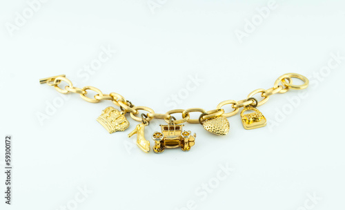 golden necklace chain jewelry on netural background