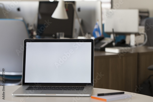 Laptop on a desk in the office