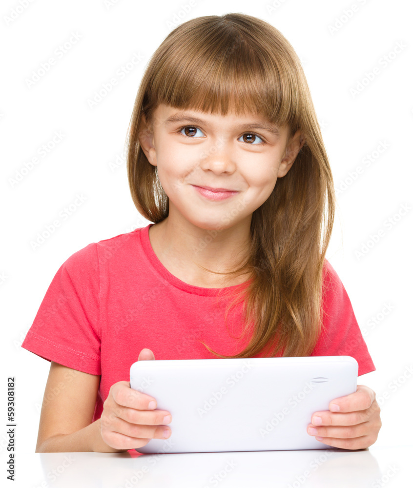 Young girl is using tablet Young girl is using tablet