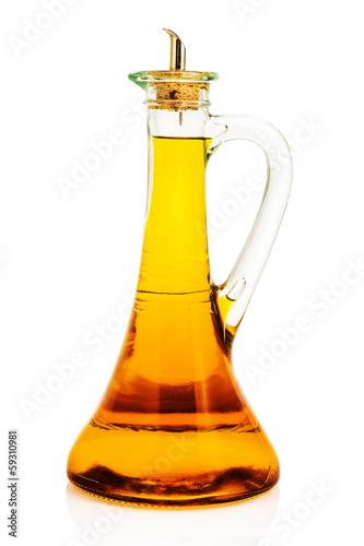 Decanter with vinegar isolated on the white background