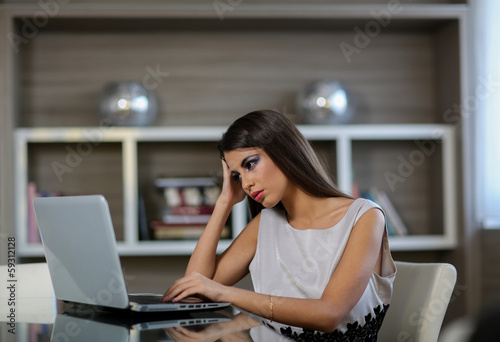 Young woman with laptop