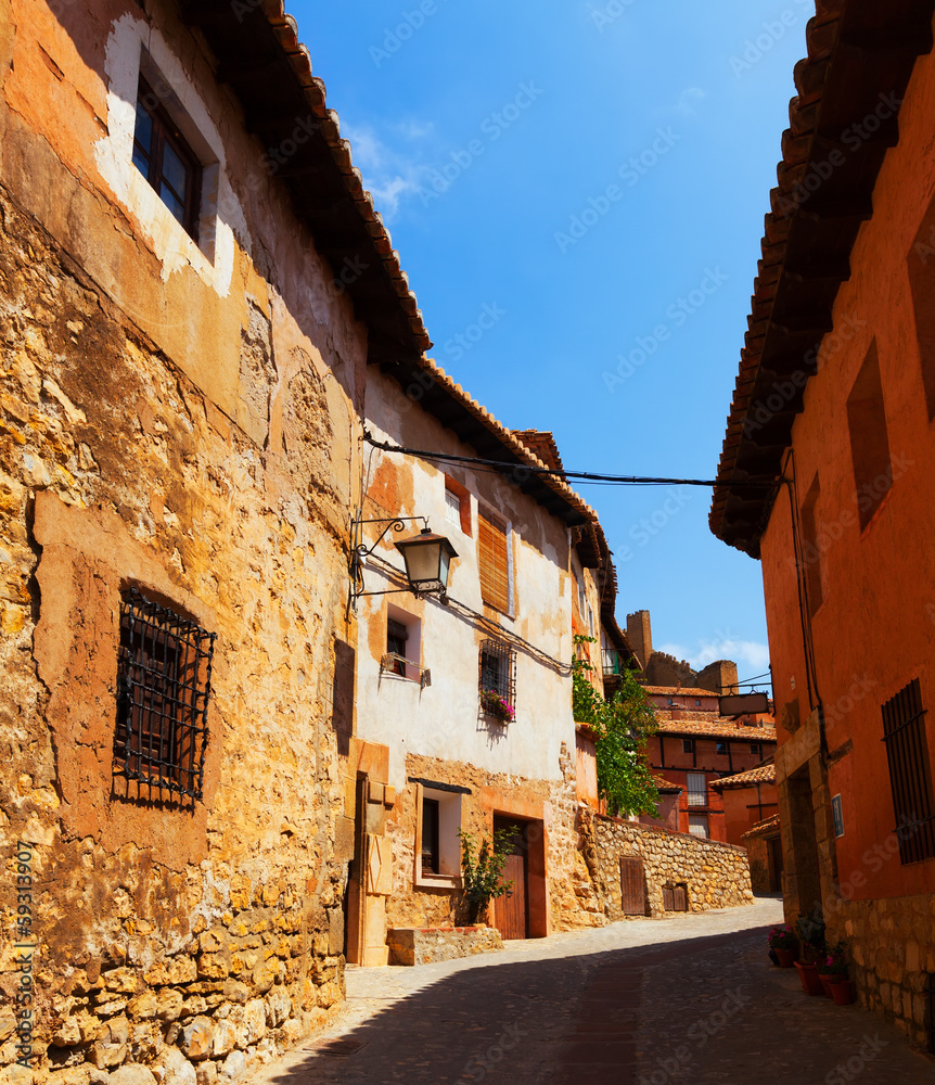 Sunny street of old spanish town