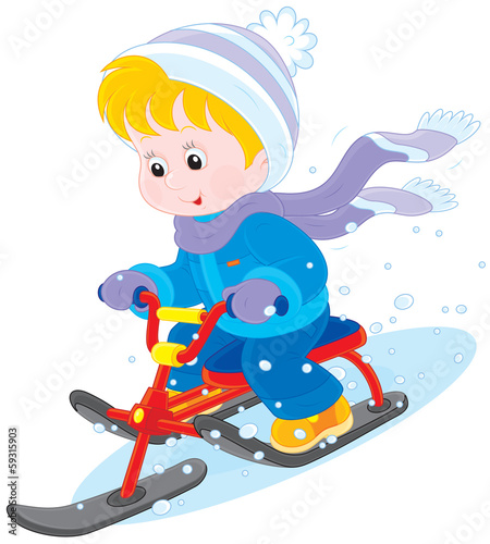 Child on a snow scooter