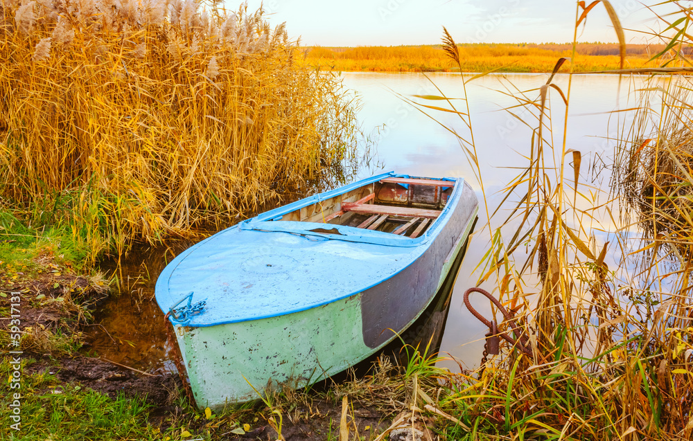 River and blue rowing boat