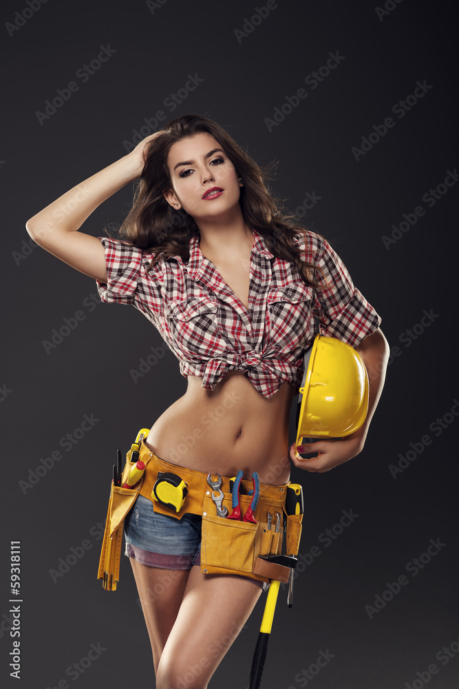 Sexy and passionate female construction worker. Stock Photo | Adobe Stock
