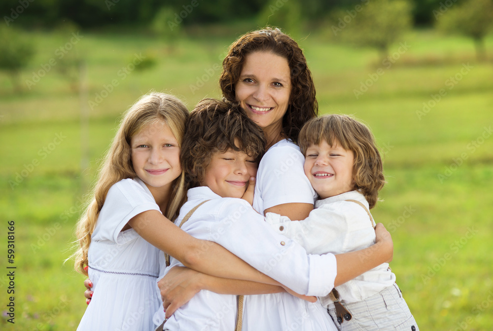 Children and mother hugging