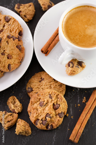 cookies with cup of coffee and cinnamon