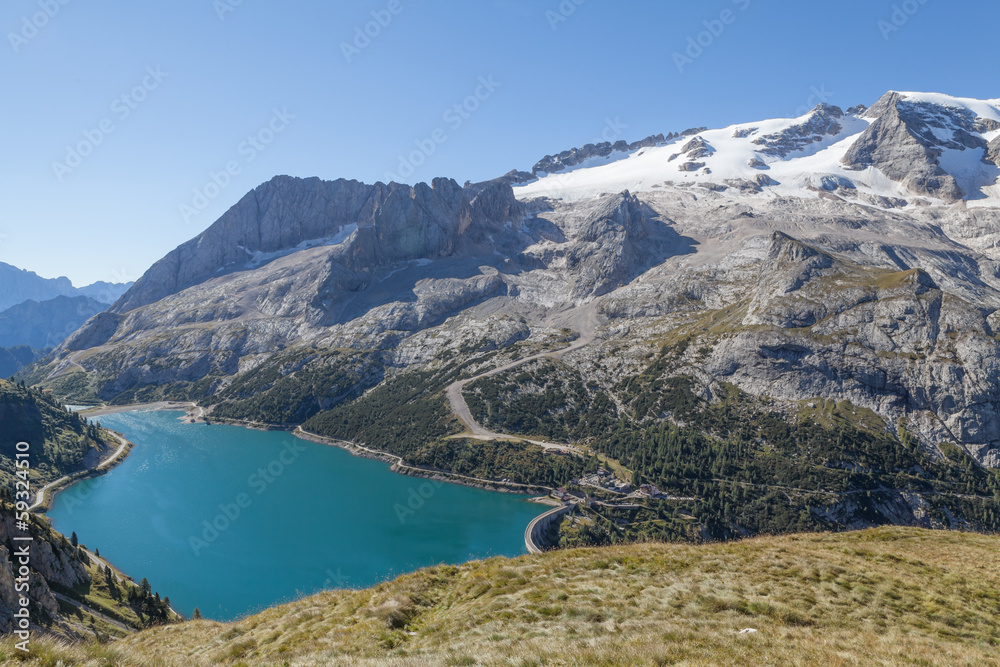 The highest peak of Dolomites Marmolada and Dam Lago di Fedaia