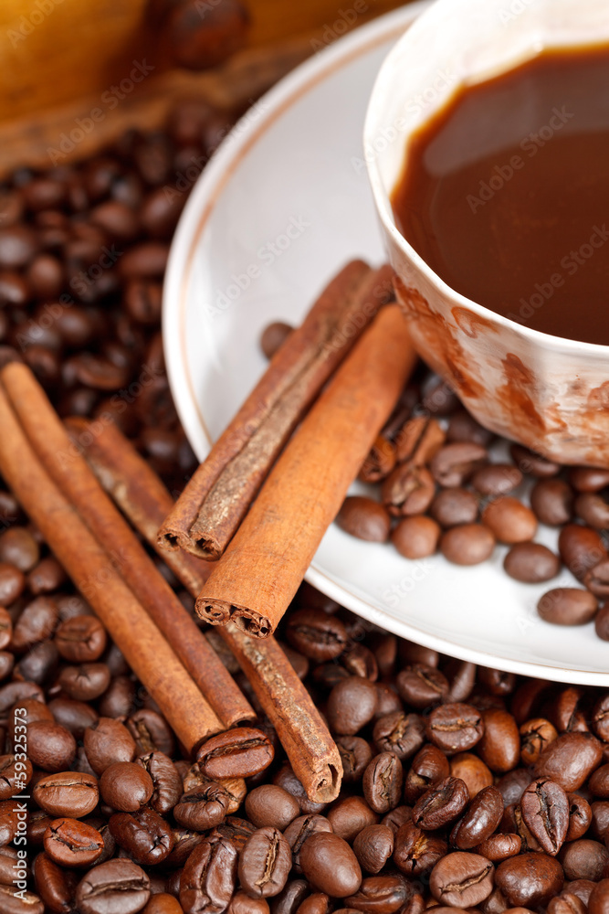 Fototapeta premium cup of coffee and roasted beans