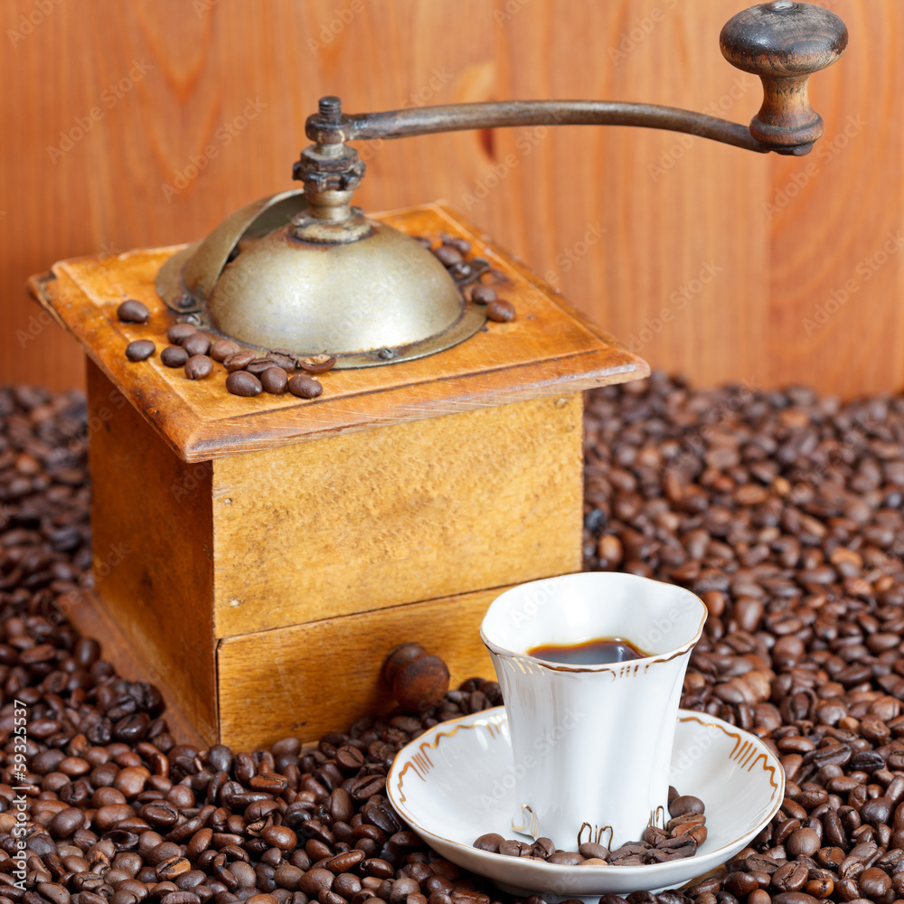 cup of coffee and roasted beans cup of coffee and roasted beans