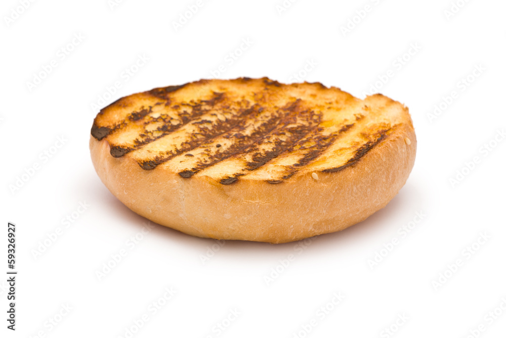 Grilled Hamburger Bun Bottom isolated on white Grilled Hamburger Bun Bottom isolated on white