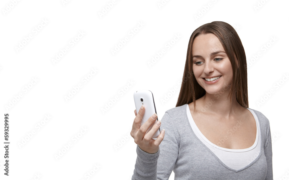 Woman looking at her mobile phone Woman looking at her mobile phone