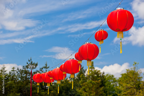 Red Chinese Paper Lanterns against a Blue Sky