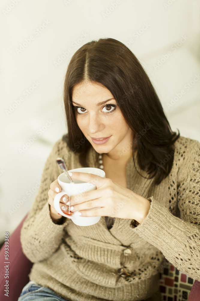 Young woman drinking tea Young woman drinking tea