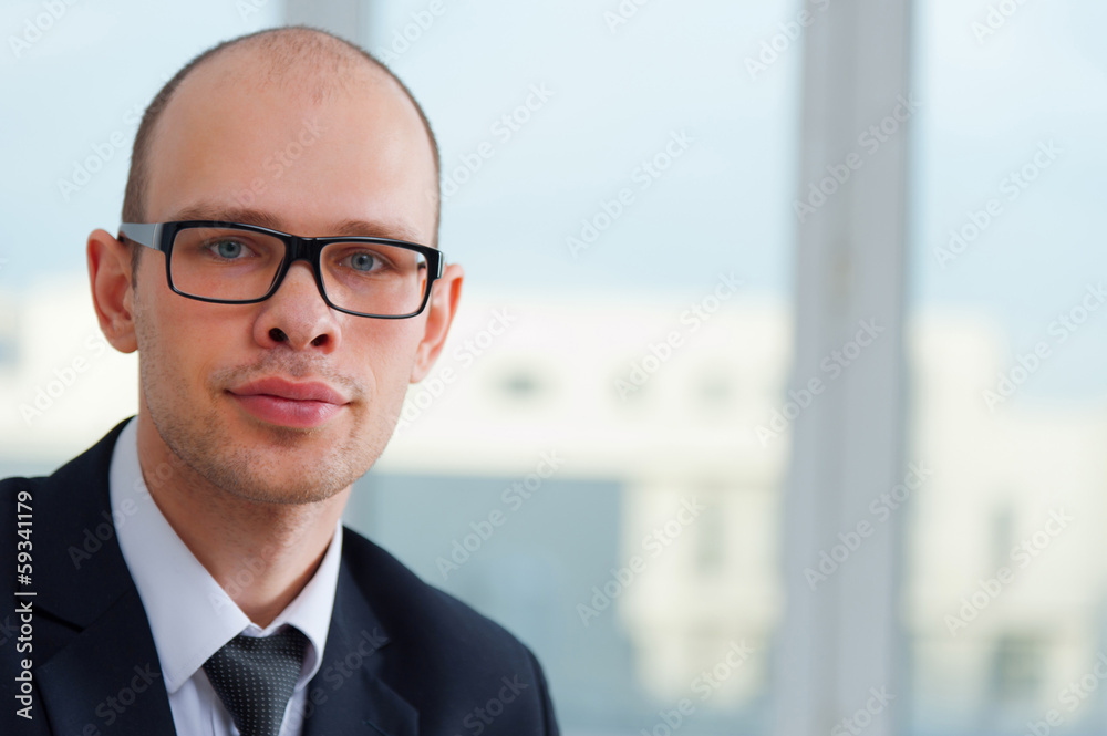 Young smiling businessman Young smiling businessman
