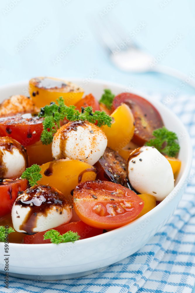 bowl of salad with mozzarella, balsamic sauce, colorful tomatoes bowl of salad with mozzarella, balsamic sauce, colorful tomatoes