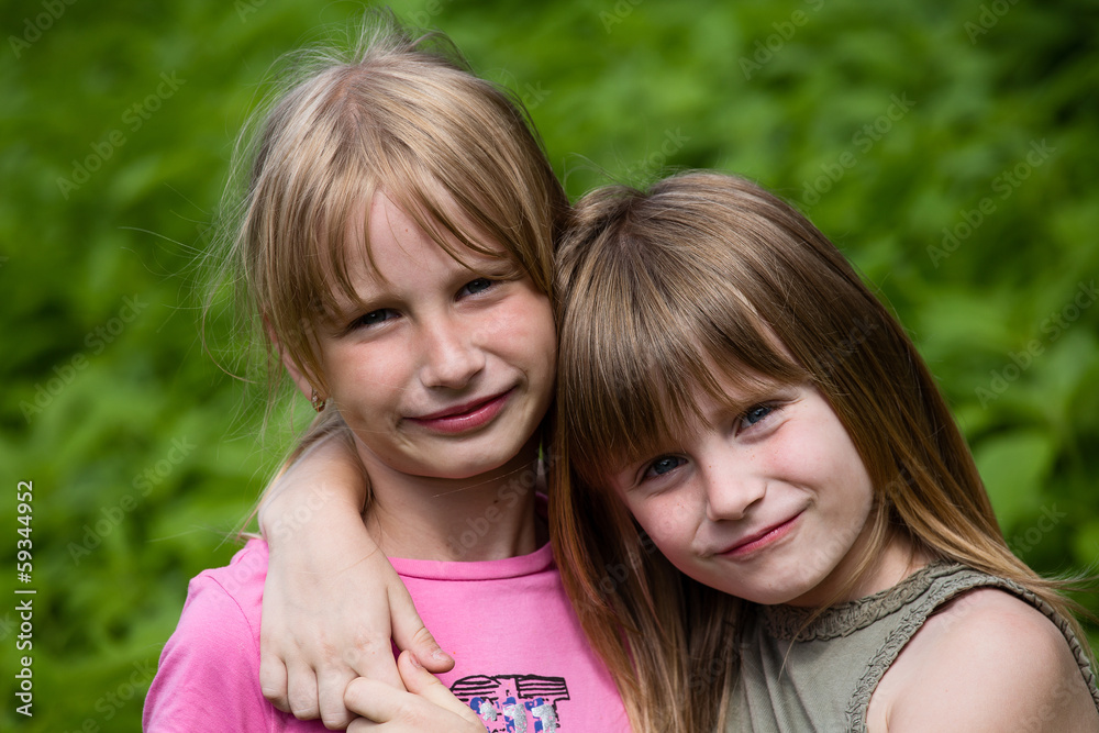 Close up portrait of the two girl child Close up portrait of the two girl child