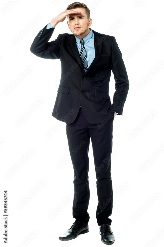 Businessman looking far far away Businessman looking far far away