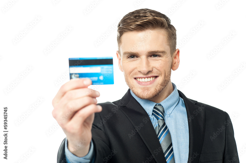 Businessman displaying his cash card Businessman displaying his cash card