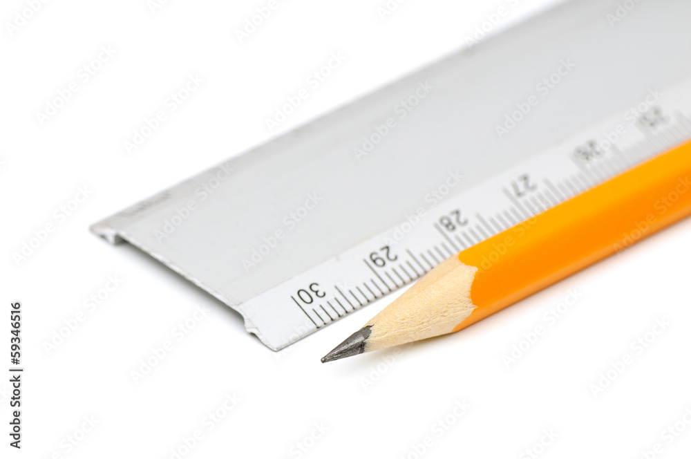 Pencil and ruler isolated on white background