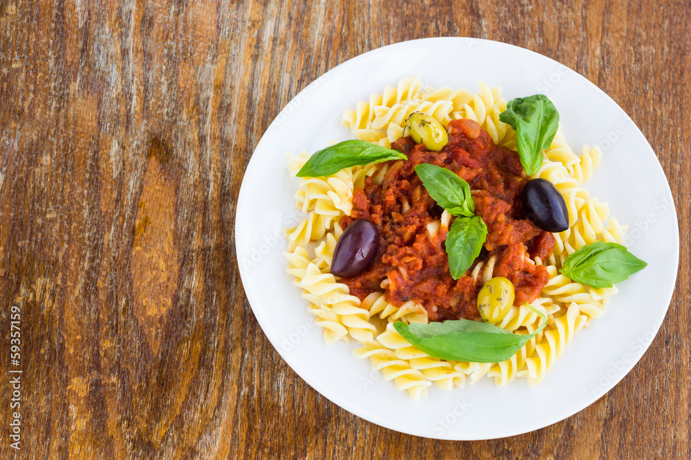 Pasta with tomato souse, olives and basil Pasta with tomato souse, olives and basil