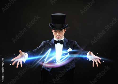 magician in top hat showing trick