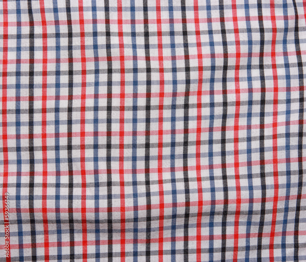 Background texture of a red and white checkered picnic blanket. Background texture of a red and white checkered picnic blanket.