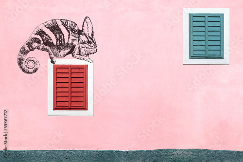 Shadows on the colored wall with windows