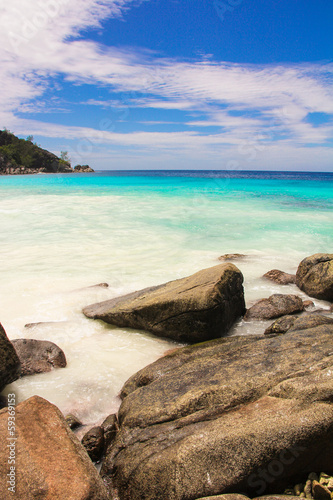 Turquoise exotic lagoon with big stones at Seychelles