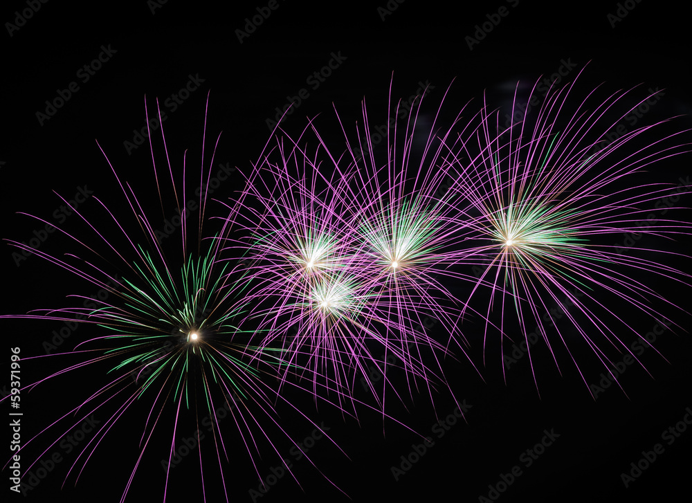 Purple fireworks in the night sky