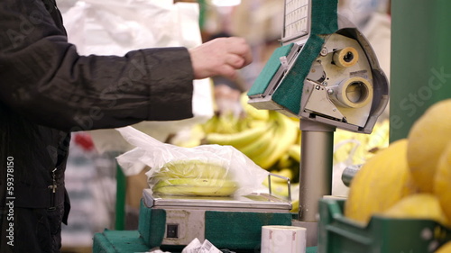 Weighing bananas in the shop. photo