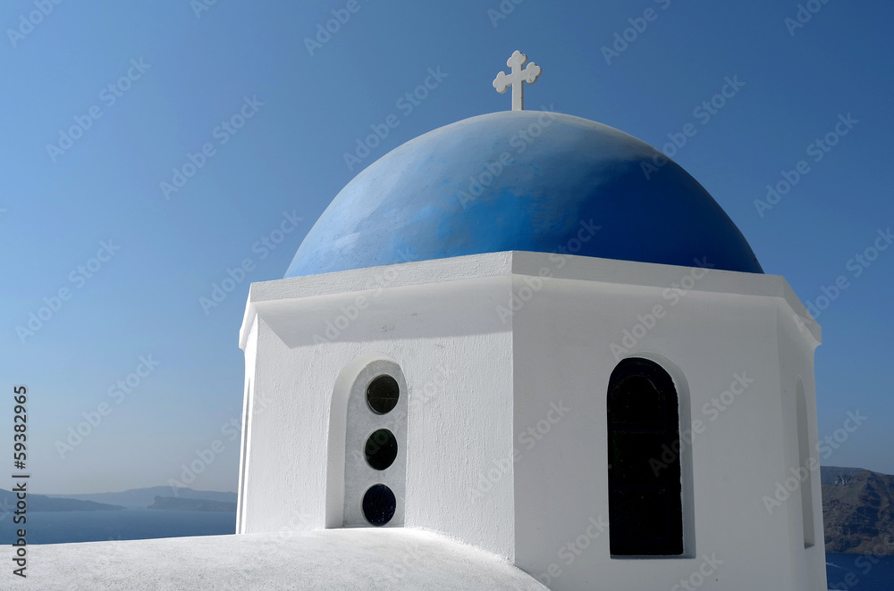Dome of a church in Oia on Santorini island in Greece.