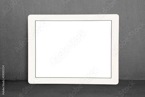 Large touch screen stand on concrete background