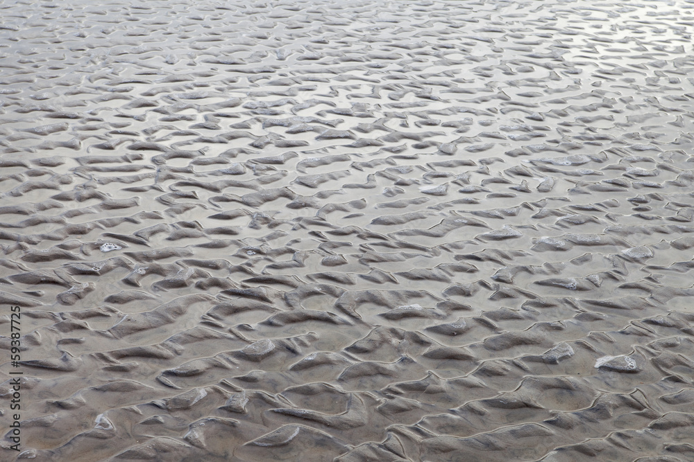 Water on sand. Water on sand.