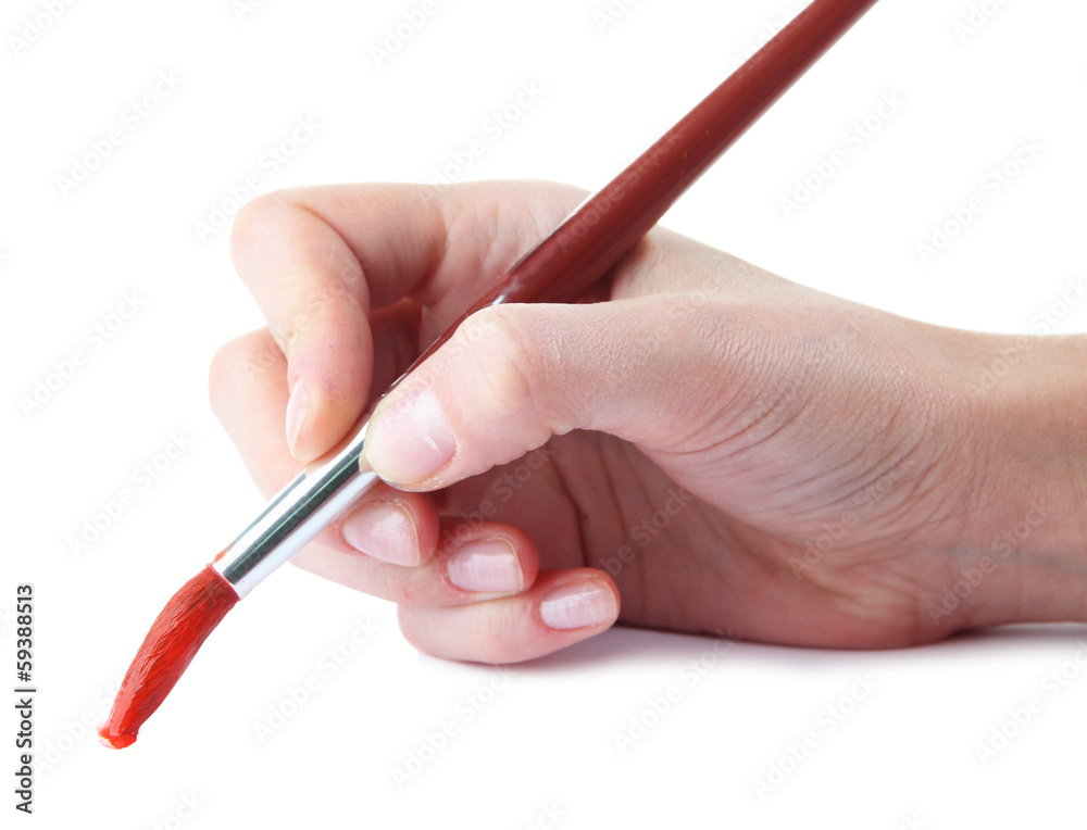 Hand holding brush with red paint isolated on white Hand holding brush with red paint isolated on white
