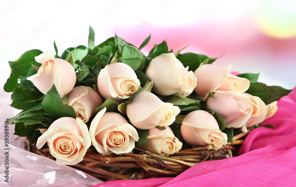 Beautiful bouquet of roses, on fabric, on light background Beautiful bouquet of roses, on fabric, on light background