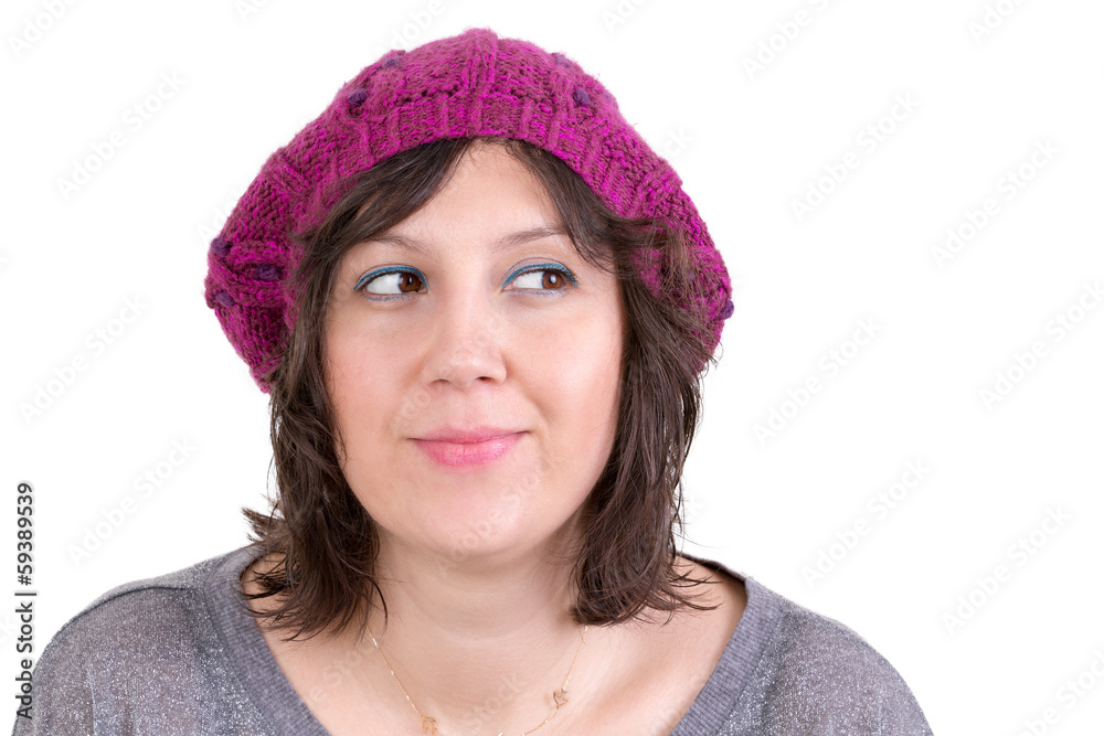 Thoughtful woman smiling in anticipation Thoughtful woman smiling in anticipation