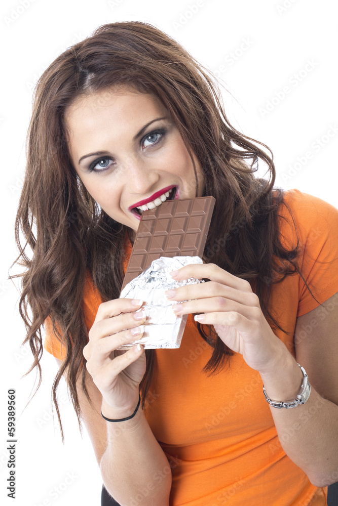 Happy Young Woman Eating Chocolate Happy Young Woman Eating Chocolate