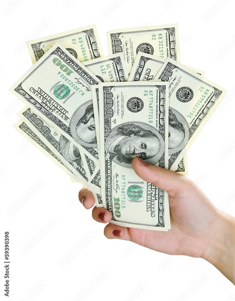 Female hand with dollars close up isolated on white Female hand with dollars close up isolated on white
