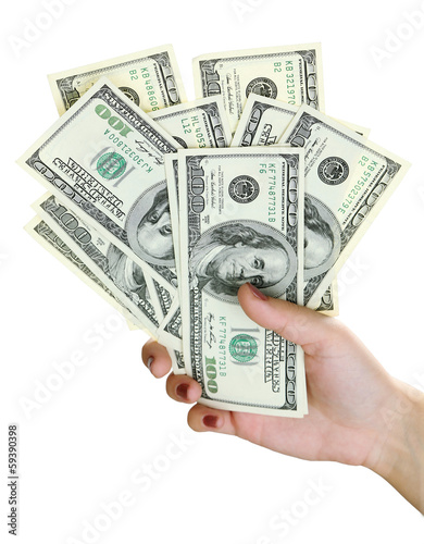 Female hand with dollars close up isolated on white