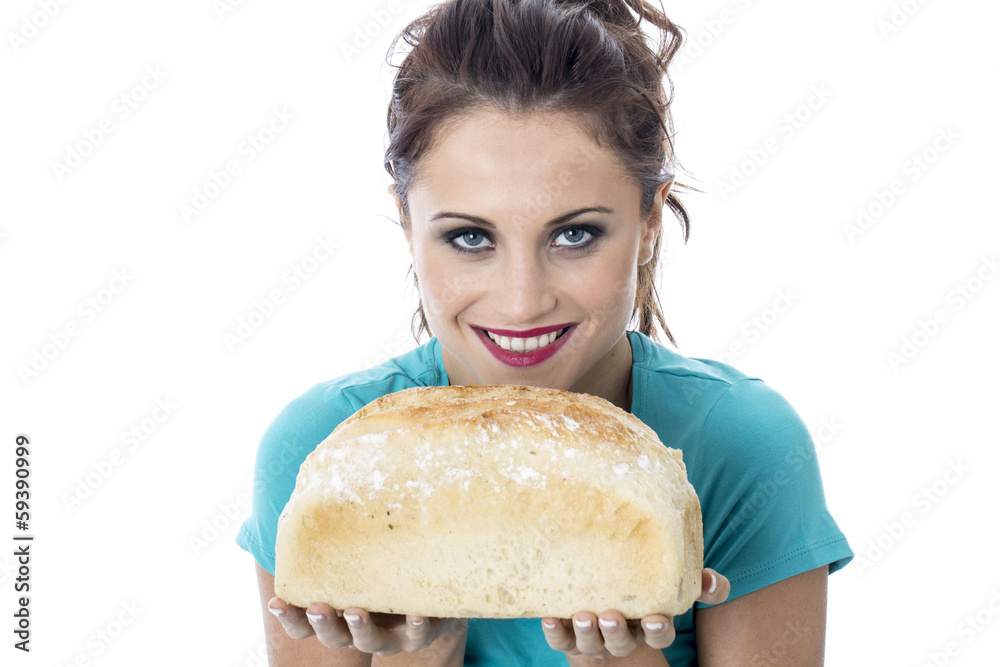 Young Woman Holding a Loaf of White Bread Young Woman Holding a Loaf of White Bread