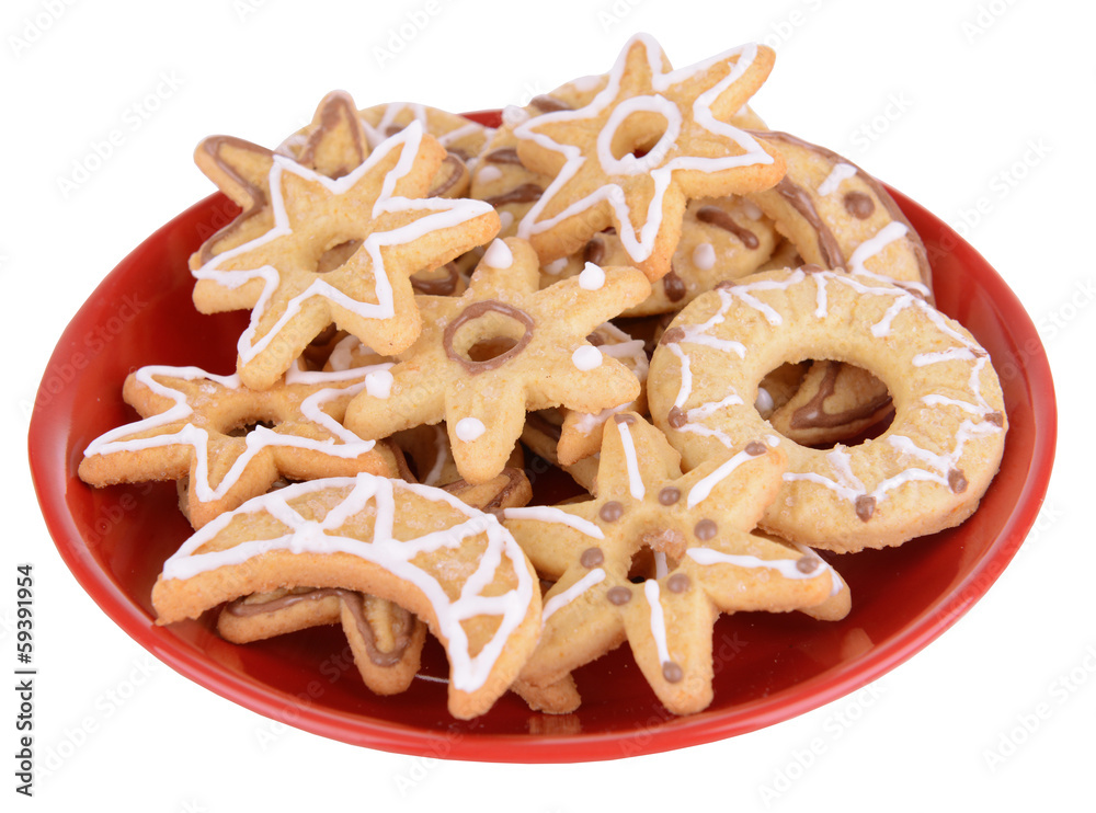 Delicious Christmas cookies on plate isolated on white