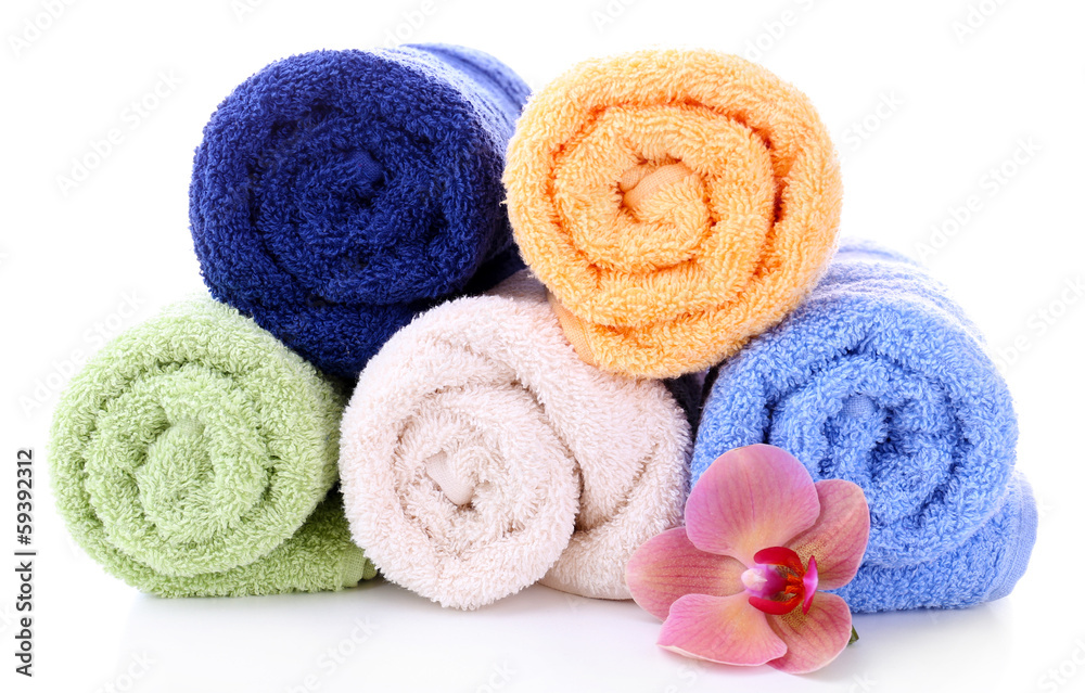 Orchid flower and towel rolls, isolated on white Orchid flower and towel rolls, isolated on white